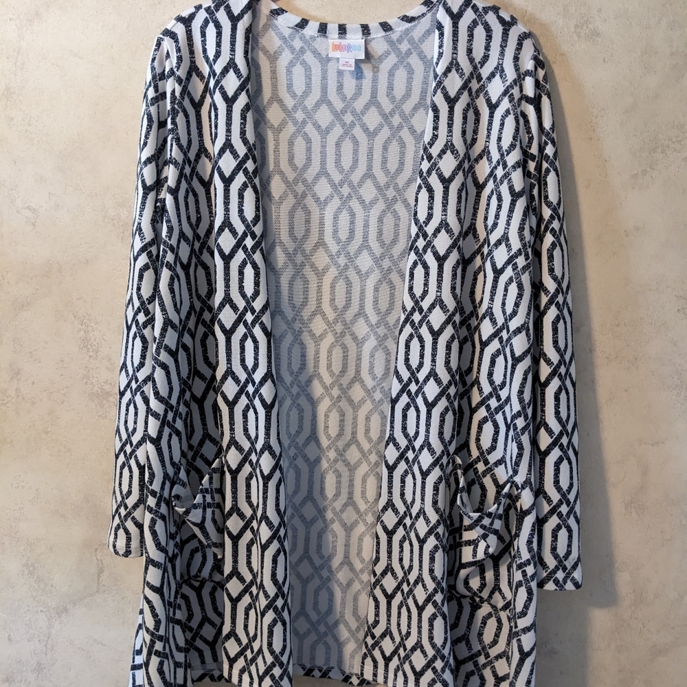 LuLaRoe cardigan. Black and white with pockets. Size medium.